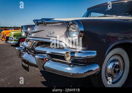 Lebanon, TN - May 13, 2022: Front corner low perspective detail view of a 1956 Dodge Coronet D500 2 Door Sedan grille at a local car show. Stock Photo