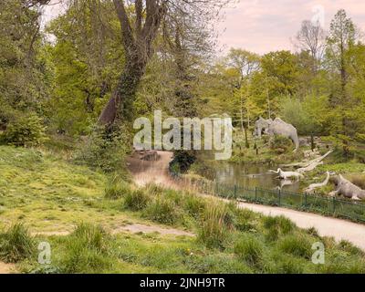 A collection of dinosaur sculptures in Crystal Palace Dinosaurs, London Stock Photo