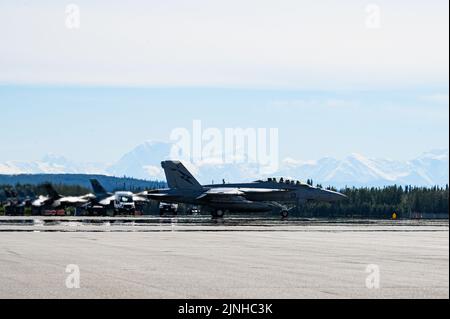 A Royal Australian Air Force F/A-18F Super Hornet taxis on the runway during RED FLAG-Alaska 22-3 on Eielson Air Force Base, Alaska, July 29, 2022. RF-A 22-3 is a Pacific Air Forces-sponsored exercise designed to provide realistic training in a simulated combat environment. (U.S. Air Force photo by Senior Airman Jose Miguel T. Tamondong) Stock Photo