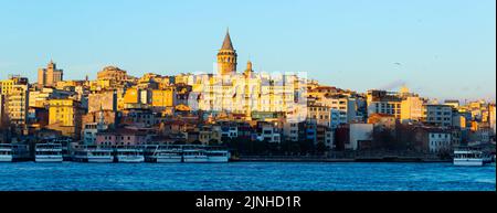 Karakoy quarter and Galata Tower from Golden Horn Bay, Istanbul Stock Photo
