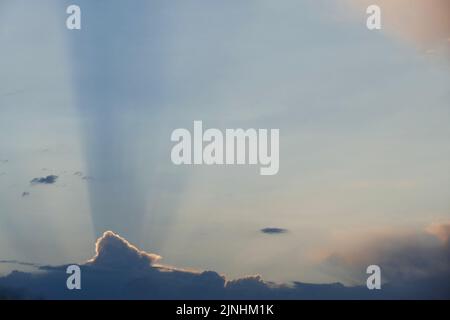 clouds on a clear day near sunset Stock Photo