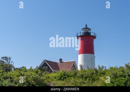 Beautiful view of Cape Cod Lighthouse. Nauset Lighthouse, has a red and white striped tower and is one of the most famous lighthouses on Cape Cod, Mas Stock Photo