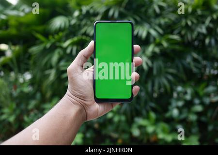 POV young man using smart phone at outdoor  Stock Photo
