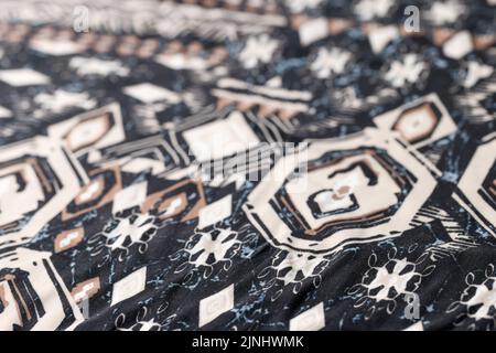 Black and white cotton fabric with geometric shapes and figures Stock Photo