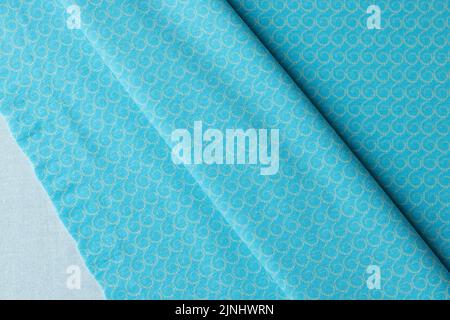 Light blue fabric cloth texture with print for background and design art work Stock Photo
