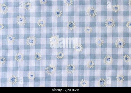Plaid fabric with floral print textured background Stock Photo