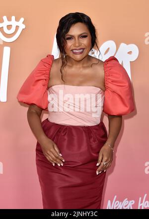Mindy Kaling walking on the red carpet at the Los Angeles premiere of