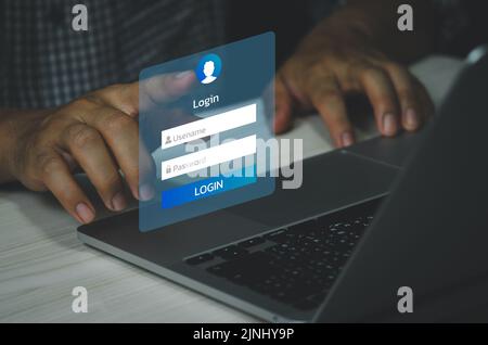 man using keyboard computer laptop login interface on touch screen. user name and password inputs on virtual digital account online concept technology Stock Photo