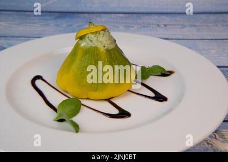 Recipe for mini patissons stuffed with mozarella, basil, tomato and balsamic vinegar Stock Photo