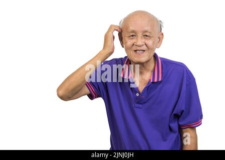 Asian elderly man standing with hands on his head white background. Stock Photo