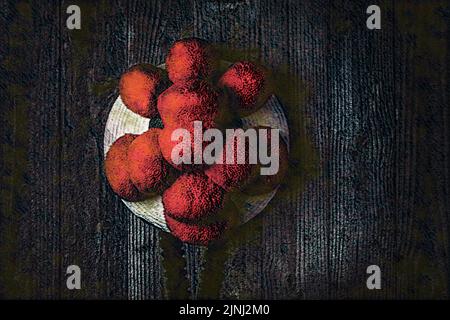 Original Black Forest Bollen hat in front of wooden wall in surrealistic style Stock Photo