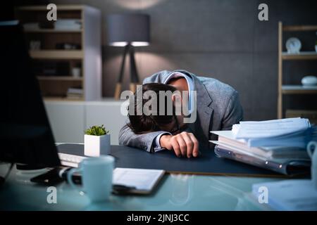 Exhausted Business Clerk Asleep. Bureaucracy Corporate Burnout Stock Photo