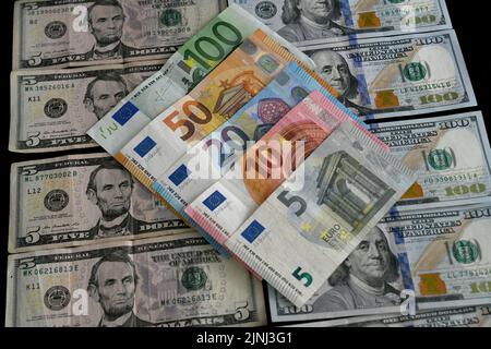 Pictures of the currencies of the euro against the dollar. The value of the euro fell against the US dollar for the first time in years Stock Photo