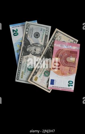 Pictures of the currencies of the euro against the dollar. The value of the euro fell against the US dollar for the first time in years Stock Photo