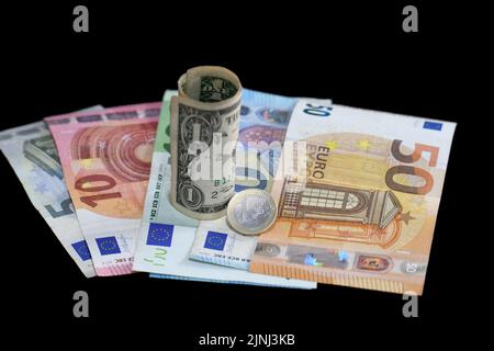 Pictures of the currencies of the euro against the dollar. The value of the euro fell against the US dollar for the first time in years Stock Photo