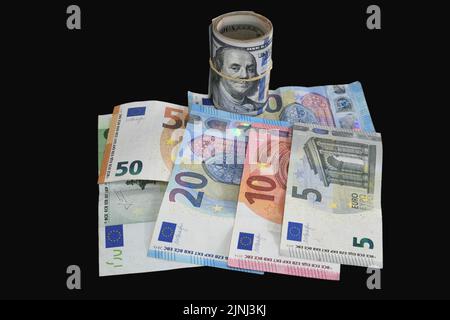 Pictures of the currencies of the euro against the dollar. The value of the euro fell against the US dollar for the first time in years Stock Photo