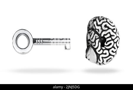 Human brain with a keyhole and a silver-toned skeleton key floating on white background. Unlock mind power concept. Stock Photo