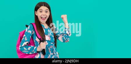 graduated. beautiful kid with long hair on blue background. Banner of schoolgirl student. School child pupil portrait with copy space. Stock Photo