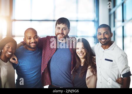 Trust, support and unity by a team of partners starting a business together. Community and teamwork with a group of excited, diverse professionals Stock Photo