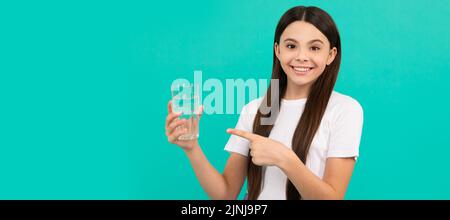 stay hydrated. kid hold glass of mineral water. child feel thirsty. Banner of child girl with glass of water, studio portrait with copy space. Stock Photo