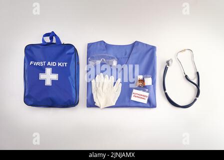Top view, doctor bag and clinic with stethoscope, books and glasses on desk  for job in medical industry. Doctors, nurse or medic tools in leather case  Stock Photo - Alamy