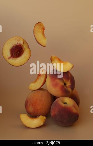 plums on the yellow background with copy space Stock Photo