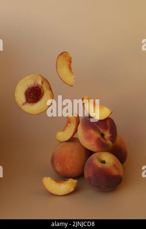 plums on the yellow background with copy space Stock Photo