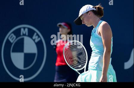 Toronto, Canada. 11th Aug, 2022. Iga Swiatek of Poland reacts during the third round of women's singles match between Iga Swiatek of Poland and Beatriz Haddad Maia of Brazil at the 2022 National Bank Open tennis tournament in Toronto, Canada, on Aug. 11, 2022. Credit: Zou Zheng/Xinhua/Alamy Live News Stock Photo