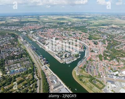 Middelburg is the capital city in the Dutch province of Zeeland on the former island Walcheren. urban skyline and city overview. Aerial drone overview Stock Photo