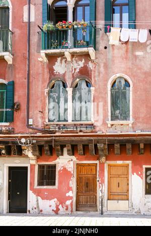 A vertical shot of an ancient building in Venice, Italy Stock Photo