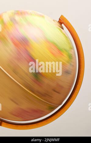 Spinning Colorful World Globe Toy Isolated Stock Photo