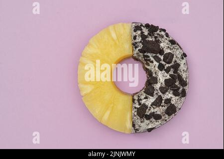 Canned Sliced Pineapple Fruit and Donut With Sprinkles Stock Photo