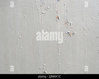Peeling plaster texture. Wall with peeling plaster. Full screen image. Stock Photo