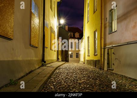 Cobbled streets of Tallinn Estonia at dusk after raining. Stock Photo