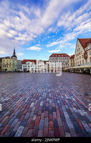 Main square with cobblestone floor and old medieval buildings. Tallinn Estonia. Stock Photo