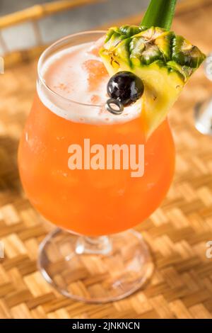 Boozy Cold Rum Runner Cocktail with Cherry and PIneapple Stock Photo