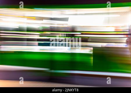Multicolored abstract banner with blurred bright spots and lines with camera movement Stock Photo