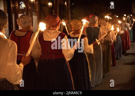 Procession of Saint John towards the Haro square in Les on the Sant Joan night festivity (Les, Aran Valley, Lleida, Catalonia, Spain, Pyrenees) Stock Photo