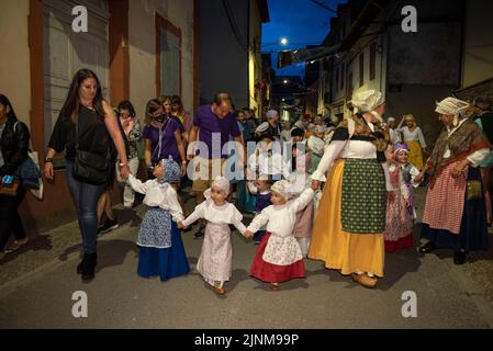 Procession of Saint John towards the Haro square in Les on the Sant Joan night festivity (Les, Aran Valley, Lleida, Catalonia, Spain, Pyrenees) Stock Photo