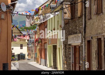 Village of Les decorated for the festival of Sant Joan due to the summer solstice (Aran Valley, Lleida, Catalonia, Spain, Pyrenees) Stock Photo