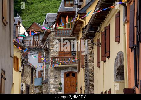 Village of Les decorated for the festival of Sant Joan due to the summer solstice (Aran Valley, Lleida, Catalonia, Spain, Pyrenees) Stock Photo