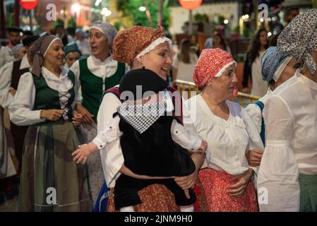 Procession of Saint John towards the Haro square in Les on the Sant Joan night festivity (Les, Aran Valley, Lleida, Catalonia, Spain, Pyrenees) Stock Photo