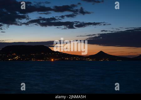 Twilight sky over the old volcanic landscape on the northwestern shore of Lake Balaton, Hungary Stock Photo