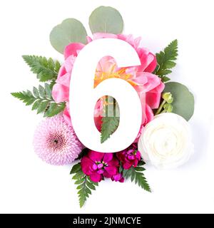 Creative layout with colorful flowers, leaves and number six isolated on white background. Anniversary concept. Flat lay. Stock Photo