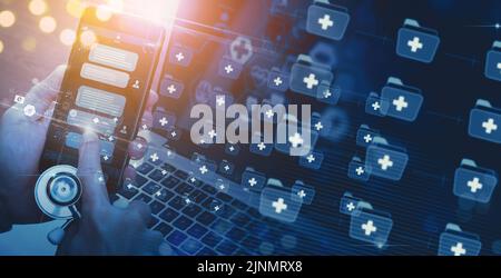 Medical doctor hand holding mobile phone Chatbot conversation app interface and artificial intelligence technology processing virtual assistant with c Stock Photo