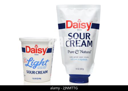 IRVINE, CALIFORNIA - 12 AUG 2022: A carton of Daisy Light Sour Cream and a squeezable package of Daisy Brand regular Sour Cream. Stock Photo