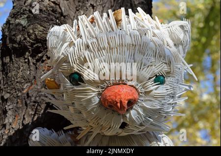 Closeup of cat made out of disposable forks in Kyiv, Ukraine. Stock Photo