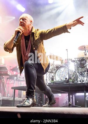 Edinburgh, UK. 12th Aug, 2022. Simple Minds at Princes Street Gardens, Edinburgh on Friday 12th August 2022 as part of the Edinburgh Summer Session concerts.  Band members:  Jim Kerr – lead vocals  Charlie Burchill – electric & acoustic guitar  Ged Grimes – bass guitar  Sarah Brown - backing vocals  Gordy Goudie - additional keyboards & guitar  Cherisse Osei - drums  Berenice Scott - keyboards   Picture: Alan Rennie Credit: Alan Rennie/Alamy Live News Stock Photo