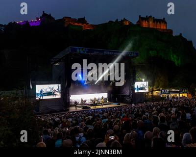 Edinburgh, UK. 12th Aug, 2022. Simple Minds at Princes Street Gardens, Edinburgh on Friday 12th August 2022 as part of the Edinburgh Summer Session concerts.  Band members:  Jim Kerr – lead vocals  Charlie Burchill – electric & acoustic guitar  Ged Grimes – bass guitar  Sarah Brown - backing vocals  Gordy Goudie - additional keyboards & guitar  Cherisse Osei - drums  Berenice Scott - keyboards   Picture: Alan Rennie Credit: Alan Rennie/Alamy Live News Stock Photo