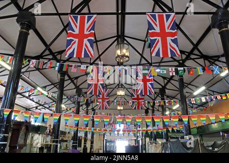 Interior of Nantwich Market, Market Street, Nantwich, Cheshire, England, UK, CW5 5DG, flags for the queens jubilee 2022 Stock Photo